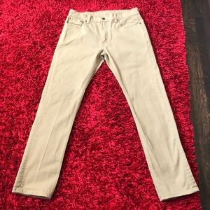 Men Levi’s Tan pants.